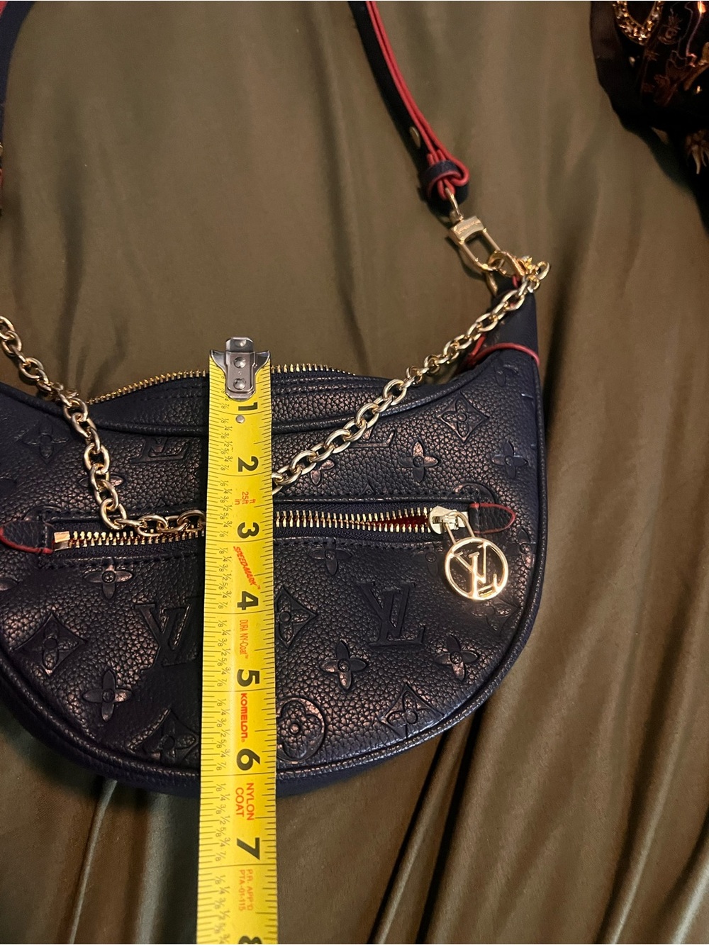 Navy EmbossedCrescent Shoulder Bag
